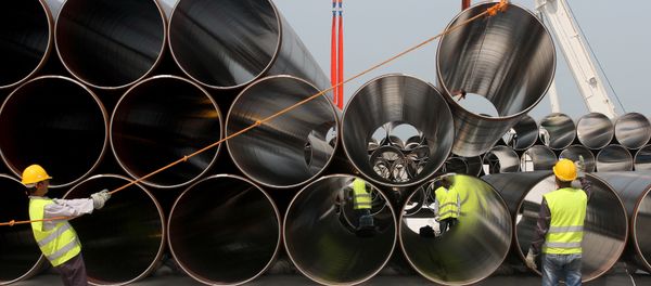 Workers unload newly arrived pipes for the construction of the future Trans-Adriatic Pipeline (File) Workers unload newly arrived pipes for the construction of the future Trans-Adriatic Pipeline (File) - Sputnik International