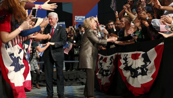 Democratic U.S. presidential candidate Hillary Clinton and her husband greet supporters. Democratic U.S. presidential candidate Hillary Clinton and her husband greet supporters. - Sputnik International
