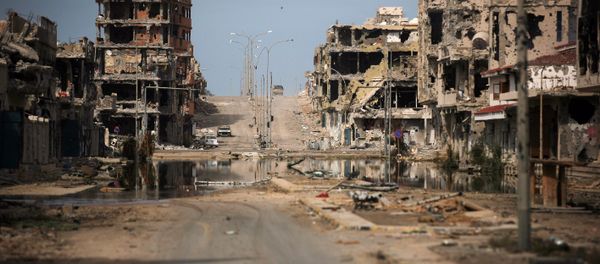 General view of buildings ravaged by fighting in Sirte, Libya (File) General view of buildings ravaged by fighting in Sirte, Libya (File) - Sputnik International