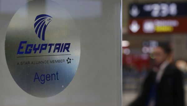 A man passes the Egyptair desk at Charles de Gaulle airport, after an Egyptair flight disappeared from radar during its flight from Paris to Cairo, in Paris, France, May 19, 2016 A man passes the Egyptair desk at Charles de Gaulle airport, after an Egyptair flight disappeared from radar during its flight from Paris to Cairo, in Paris, France, May 19, 2016 - Sputnik International