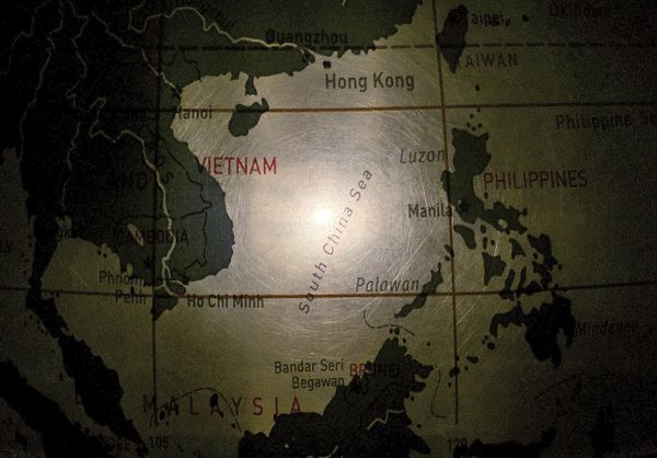In this May 1, 2016, photo, an illuminated globe shows the South China Sea at a museum in Pathumthani, Thailand In this May 1, 2016, photo, an illuminated globe shows the South China Sea at a museum in Pathumthani, Thailand - Sputnik International