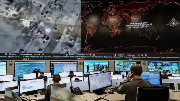 Russian Defense Ministry officers seen here at the National Defense Management Center, Moscow - Sputnik International