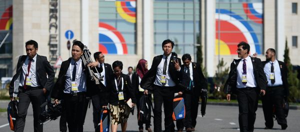 Journalists working at the International Press Centre for the ASEAN-Russia Summit near the congress centre in Sochi - Sputnik International