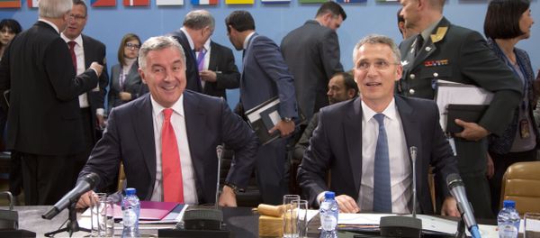 NATO Secretary General Jens Stoltenberg, right, and Montenegro's Prime Minister Milo Dukanovic, left, take their seats during a meeting of the North Atlantic Council and Montenegro at NATO headquarters in Brussels on Thursday, May 19, 2016 NATO Secretary General Jens Stoltenberg, right, and Montenegro's Prime Minister Milo Dukanovic, left, take their seats during a meeting of the North Atlantic Council and Montenegro at NATO headquarters in Brussels on Thursday, May 19, 2016 - Sputnik International