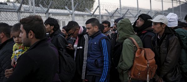 Refugees and migrants wait to be registered at the Moria refugee camp on the Greek island of Lesbos, November 5, 2015. Refugees and migrants wait to be registered at the Moria refugee camp on the Greek island of Lesbos, November 5, 2015. - Sputnik International