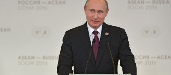 Russian President Vladimir Putin and Prime Minister of Laos Thongloun Sisoulith hold news conference following ASEAN-Russia Summit Russian President Vladimir Putin and Prime Minister of Laos Thongloun Sisoulith hold news conference following ASEAN-Russia Summit - Sputnik International