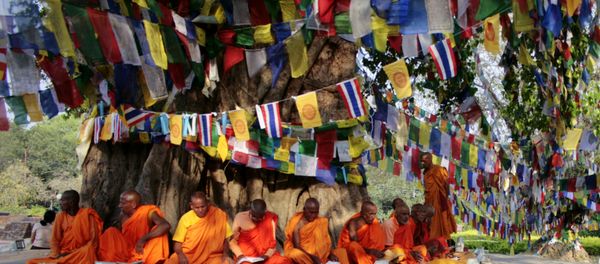 Monks chant as they sit under the Bodhi tree adjacent to the Maya Devi Temple in Lumbini. (File) - Sputnik International