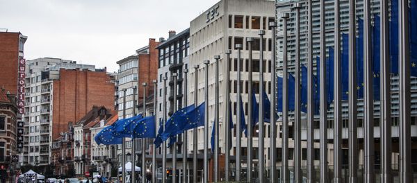 Flags near the European Commission's headquarters in Brussels Flags near the European Commission's headquarters in Brussels - Sputnik International