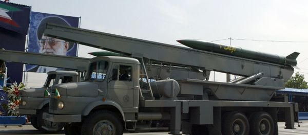 Iranian Nazeat 10 ground-to-air missile is displayed during the army day military parade, outside the mausoleum of the late founder of Islamic republic, Ayatollah Khomeini (poster) in Tehran. (File) Iranian Nazeat 10 ground-to-air missile is displayed during the army day military parade, outside the mausoleum of the late founder of Islamic republic, Ayatollah Khomeini (poster) in Tehran. (File) - Sputnik International
