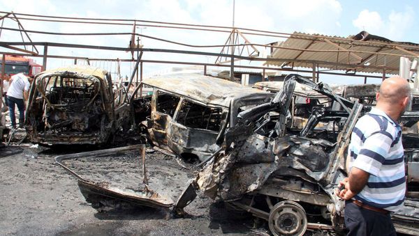 People inspect the damage after explosions hit the Syrian city of Tartous, in this handout picture provided by SANA on May 23, 2016. People inspect the damage after explosions hit the Syrian city of Tartous, in this handout picture provided by SANA on May 23, 2016. - Sputnik International