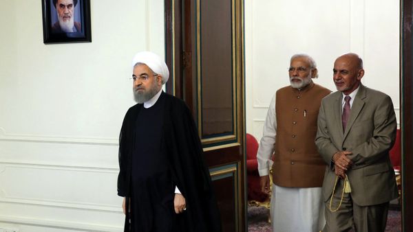 Afghanistan President Ashraf Ghani, right, Indian Prime Minister Narendra Modi, center, and Iranian President Hassan Rouhani, left, arrive to attend their trilateral meeting at the Saadabad Palace in Tehran, Iran, Monday, May 23, 2016. Afghanistan President Ashraf Ghani, right, Indian Prime Minister Narendra Modi, center, and Iranian President Hassan Rouhani, left, arrive to attend their trilateral meeting at the Saadabad Palace in Tehran, Iran, Monday, May 23, 2016. - Sputnik International