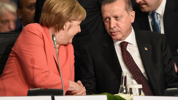 German Chancellor Angela Merkel (L) chats with Turkish President Tayyip Erdogan during the World Humanitarian Summit in Istanbul, Turkey, May 23, 2016. German Chancellor Angela Merkel (L) chats with Turkish President Tayyip Erdogan during the World Humanitarian Summit in Istanbul, Turkey, May 23, 2016. - Sputnik International