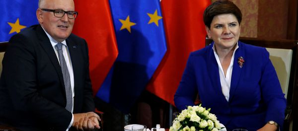 Poland's Prime Minister Beata Szydlo meets with Frans Timmermans, deputy head of the European Commission at the Prime Minister Chancellery in Warsaw, Poland May 24, 2016. Poland's Prime Minister Beata Szydlo meets with Frans Timmermans, deputy head of the European Commission at the Prime Minister Chancellery in Warsaw, Poland May 24, 2016. - Sputnik International