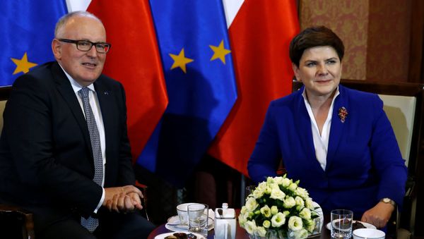 Poland's Prime Minister Beata Szydlo meets with Frans Timmermans, deputy head of the European Commission at the Prime Minister Chancellery in Warsaw, Poland May 24, 2016. Poland's Prime Minister Beata Szydlo meets with Frans Timmermans, deputy head of the European Commission at the Prime Minister Chancellery in Warsaw, Poland May 24, 2016. - Sputnik International