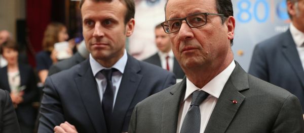 French Economy Minister Emmanuel Macron (L) alongside President Francois Hollande (R). File photo. French Economy Minister Emmanuel Macron (L) alongside President Francois Hollande (R). File photo. - Sputnik International