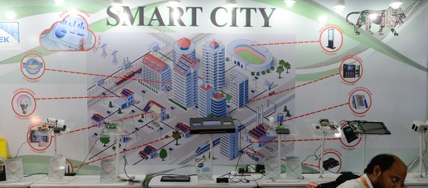 An Indian delagate talks on a phone during the Smart Cities India 2016 expo in New Delhi on May 12, 2016 - Sputnik International