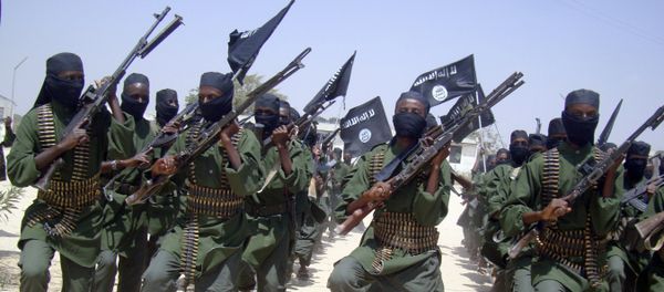In this Thursday, Feb. 17, 2011 file photo, al-Shabab fighters march with their weapons during military exercises on the outskirts of Mogadishu, Somalia In this Thursday, Feb. 17, 2011 file photo, al-Shabab fighters march with their weapons during military exercises on the outskirts of Mogadishu, Somalia - Sputnik International