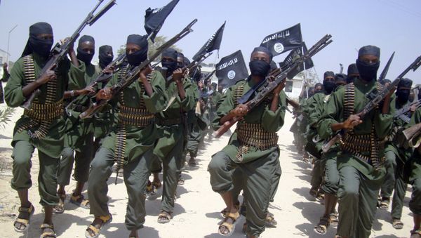 In this Thursday, Feb. 17, 2011 file photo, al-Shabab fighters march with their weapons during military exercises on the outskirts of Mogadishu, Somalia In this Thursday, Feb. 17, 2011 file photo, al-Shabab fighters march with their weapons during military exercises on the outskirts of Mogadishu, Somalia - Sputnik International