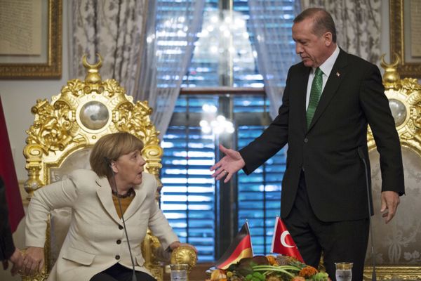 Turkish President Recep Tayyip Erdogan, right, offers his hand to shake hands with Germany's Chancellor Angela Merkel (File) Turkish President Recep Tayyip Erdogan, right, offers his hand to shake hands with Germany's Chancellor Angela Merkel (File) - Sputnik International