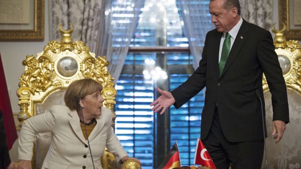 Turkish President Recep Tayyip Erdogan, right, offers his hand to shake hands with Germany's Chancellor Angela Merkel (File) Turkish President Recep Tayyip Erdogan, right, offers his hand to shake hands with Germany's Chancellor Angela Merkel (File) - Sputnik International