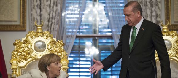 Turkish President Recep Tayyip Erdogan, right, offers his hand to shake hands with Germany's Chancellor Angela Merkel (File) Turkish President Recep Tayyip Erdogan, right, offers his hand to shake hands with Germany's Chancellor Angela Merkel (File) - Sputnik International