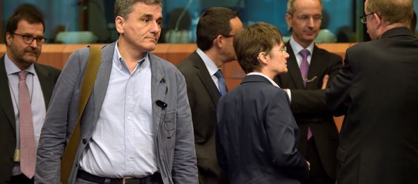 Greece's finance Minister Euclid Tsakalotos arrives at a Euro zone finance ministers meeting to discuss whether Greece has passed sufficient reforms to unblock new loans and how international lenders might grant Athens debt relief, in Brussels, Belgium May 24, 2016. Greece's finance Minister Euclid Tsakalotos arrives at a Euro zone finance ministers meeting to discuss whether Greece has passed sufficient reforms to unblock new loans and how international lenders might grant Athens debt relief, in Brussels, Belgium May 24, 2016. - Sputnik International