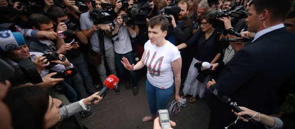Ukrainian pilot Nadezhda Savchenko at Kiev airport Ukrainian pilot Nadezhda Savchenko at Kiev airport - Sputnik International