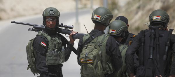 Members of the Iraqi military team get ready to compete during the 6th annual Warrior Competition at King Abdullah Special Operations Training Center, (KASOTC), in Amman, Jordan. File photo. Members of the Iraqi military team get ready to compete during the 6th annual Warrior Competition at King Abdullah Special Operations Training Center, (KASOTC), in Amman, Jordan. File photo. - Sputnik International