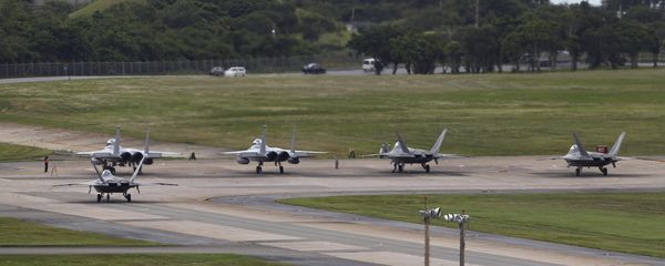 U.S. Air Force F-22 Raptors, right, and two F-15 Eagles prepare for take-off at Kadena Air Base on the southern island of Okinawa, in Japan (File) U.S. Air Force F-22 Raptors, right, and two F-15 Eagles prepare for take-off at Kadena Air Base on the southern island of Okinawa, in Japan (File) - Sputnik International