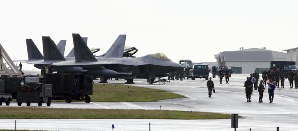 US Air Force's new stealth fighters F-22A Raptor (L) are lined up at the Kadena US Air Base, in Kadena town (File) US Air Force's new stealth fighters F-22A Raptor (L) are lined up at the Kadena US Air Base, in Kadena town (File) - Sputnik International