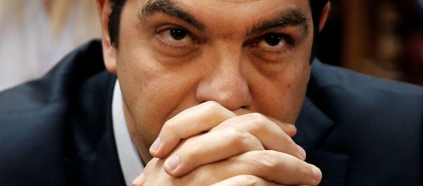 Greek Prime Minister Alexis Tsipras looks on before a ruling Syriza party parliamentary group session in Athens, Greece, May 6, 2016. Greek Prime Minister Alexis Tsipras looks on before a ruling Syriza party parliamentary group session in Athens, Greece, May 6, 2016. - Sputnik International