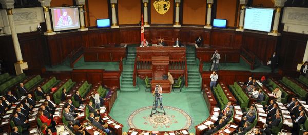 Tunisian parliament members gather during the inaugural session of the newly elected Tunisian parliament in Tunis, Tuesday, Dec. 2, 2014 - Sputnik International