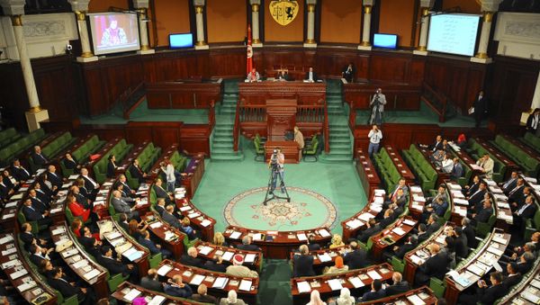 Tunisian parliament members gather during the inaugural session of the newly elected Tunisian parliament in Tunis, Tuesday, Dec. 2, 2014 - Sputnik International