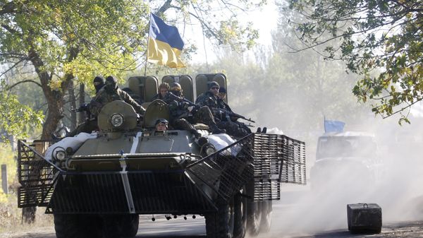 Ukrainian troops patrol in armored vehicles (File) - Sputnik International