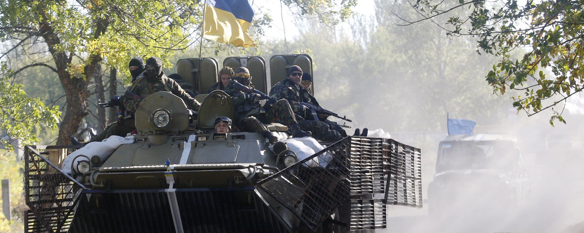 Ukrainian troops patrol in armored vehicles (File) Ukrainian troops patrol in armored vehicles (File) - Sputnik International, 1920, 20.01.2023