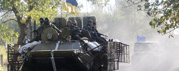Ukrainian troops patrol in armored vehicles (File) Ukrainian troops patrol in armored vehicles (File) - Sputnik International
