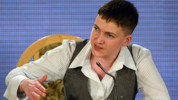 Ukrainian army pilot Nadezhda Savchenko at a news conference in Kiev Ukrainian army pilot Nadezhda Savchenko at a news conference in Kiev - Sputnik International