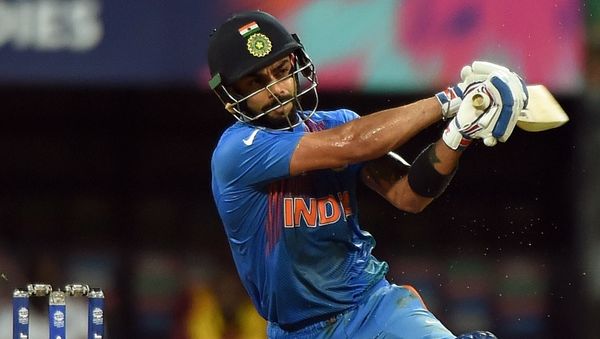India's Virat Kohli plays a shot during the World T20 cricket tournament semi-final match between India and West Indies at The Wankhede Cricket Stadium in Mumbai on March 31, 2016 - Sputnik International