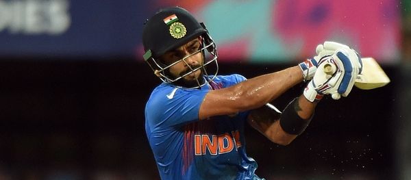 India's Virat Kohli plays a shot during the World T20 cricket tournament semi-final match between India and West Indies at The Wankhede Cricket Stadium in Mumbai on March 31, 2016 - Sputnik International