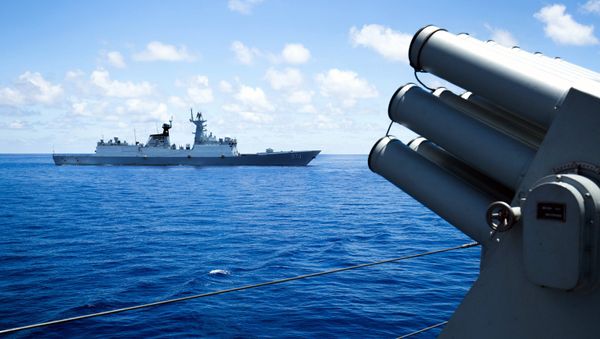 This photo taken on May 10, 2016 shows crew members of China's South Sea Fleet taking part in a logistics supply drill near the James Shoal area on South China Sea - Sputnik International