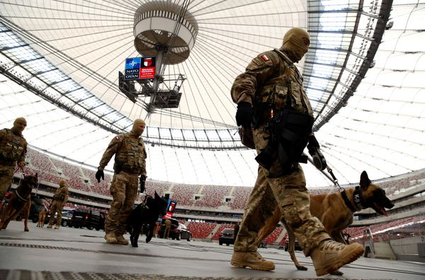 Soldiers walk after demonstration of their skills during a military police exercise before the NATO summit in July in Warsaw at the PGE National Stadium in Warsaw, Poland May 24, 2016 Soldiers walk after demonstration of their skills during a military police exercise before the NATO summit in July in Warsaw at the PGE National Stadium in Warsaw, Poland May 24, 2016 - Sputnik International
