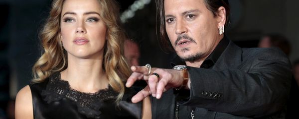 Cast member Johnny Depp and his actress wife Amber Heard arrive for the premiere of the British film Black Mass in London, Britain October 11, 2015. - Sputnik International