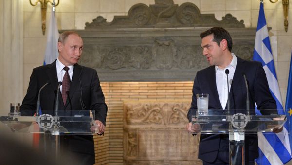 May 27, 2016. Russian President Vladimir Putin, left, and Greek Prime Minister Alexis Tsipras during a joint news conference following Russian-Greek talks in Athens. - Sputnik International