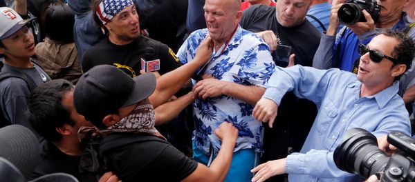 Trump supporters and anti-Trump demonstrators clash outside a campaign event for U.S. presidential candidate Donald Trump in San Diego, California, U.S. May 27, 2016. Trump supporters and anti-Trump demonstrators clash outside a campaign event for U.S. presidential candidate Donald Trump in San Diego, California, U.S. May 27, 2016. - Sputnik International