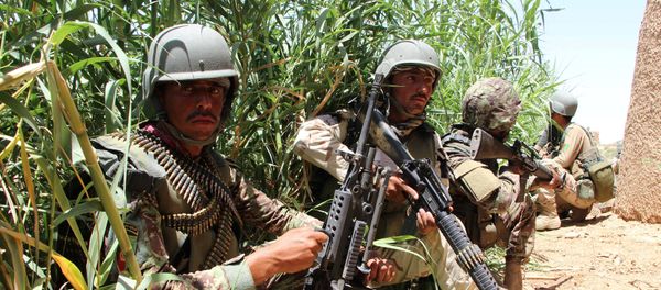 Afghan National Army (ANA) soldiers keep watch at an outpost in Marjah district of Helmand province, Afghanistan. Afghan National Army (ANA) soldiers keep watch at an outpost in Marjah district of Helmand province, Afghanistan. - Sputnik International
