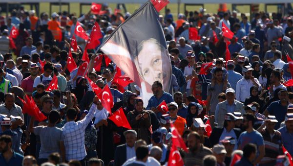 A man waves a flag with the image of Turkish President Tayyip Erdogan during a rally to mark the 563rd anniversary of the conquest of the city by Ottoman Turks, in Istanbul, Turkey, May 29, 2016. A man waves a flag with the image of Turkish President Tayyip Erdogan during a rally to mark the 563rd anniversary of the conquest of the city by Ottoman Turks, in Istanbul, Turkey, May 29, 2016. - Sputnik International