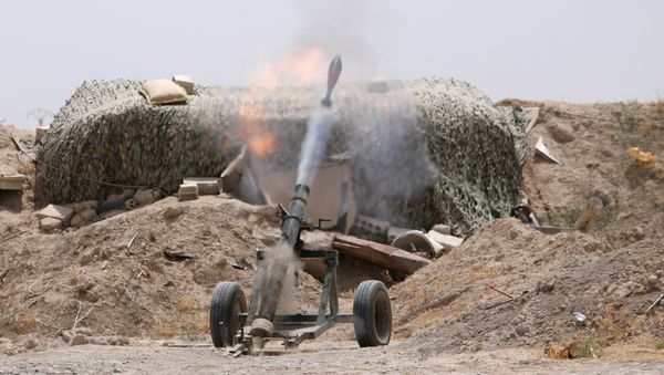 Fighters of the Syria Democratic Forces fire a mortar shell towards positions held by Islamic State fighters in northern province of Raqqa, Syria May 27, 2016 Fighters of the Syria Democratic Forces fire a mortar shell towards positions held by Islamic State fighters in northern province of Raqqa, Syria May 27, 2016 - Sputnik International