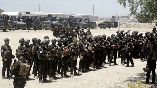 Iraq's elite counter-terrorism forces gather ahead of an operation to re-take the Daesh-held City of Fallujah, outside Fallujah, Iraq, Sunday, May 29, 2016. Iraq's elite counter-terrorism forces gather ahead of an operation to re-take the Daesh-held City of Fallujah, outside Fallujah, Iraq, Sunday, May 29, 2016. - Sputnik International