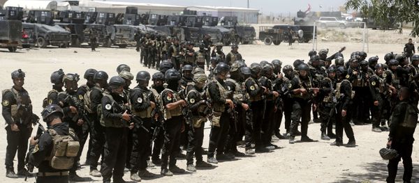 Iraq's elite counter-terrorism forces gather ahead of an operation to re-take the Daesh-held City of Fallujah, outside Fallujah, Iraq, Sunday, May 29, 2016. Iraq's elite counter-terrorism forces gather ahead of an operation to re-take the Daesh-held City of Fallujah, outside Fallujah, Iraq, Sunday, May 29, 2016. - Sputnik International