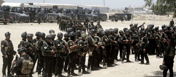Iraq's elite counter-terrorism forces gather ahead of an operation to re-take the Islamic State-held City of Fallujah, outside Fallujah, Iraq, Sunday, May 29, 2016. Iraq's elite counter-terrorism forces gather ahead of an operation to re-take the Islamic State-held City of Fallujah, outside Fallujah, Iraq, Sunday, May 29, 2016. - Sputnik International